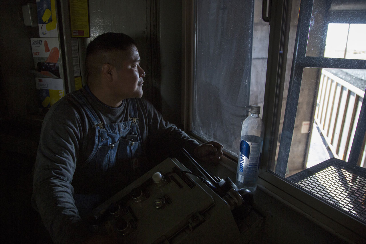 Dustin Cornfield, 30, releases loads of coal into rail cars bound from the Kayenta Mine to the Navajo Generating Station. "We're just trying to stay positive," Cornfield says about the mine's closing. "Hopefully, we get a buyer and we can keep going." Dustin Cornfield, 30, releases loads of coal into rail cars bound from the Kayenta Mine to the Navajo Generating Station. "We're just trying to stay positive," Cornfield says about the mine's closing. "Hopefully, we get a buyer and we can keep going."
